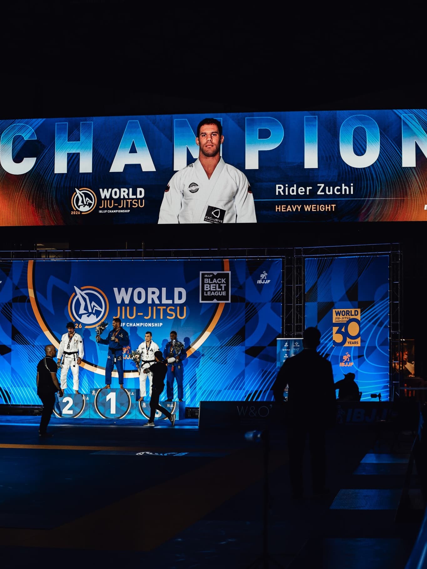 Athletes on the podium at a jiu-jitsu championship